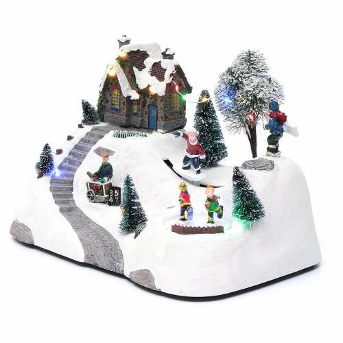 Moving christmas scene with music and ice skating | online sales on
